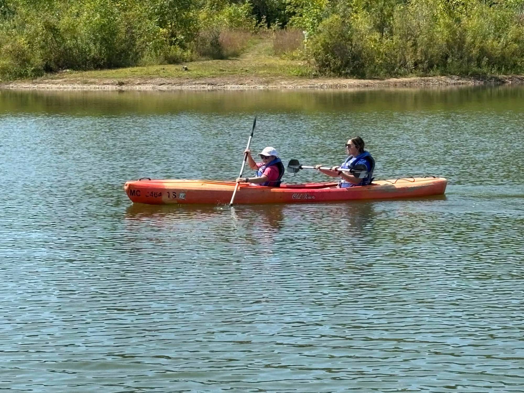 two students in kayak